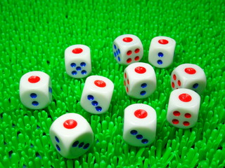 Dice on green background