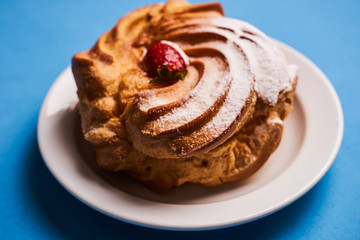 Delicious French dessert puff pastry profiteroles