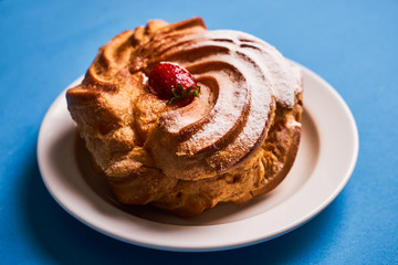 Delicious French dessert puff pastry profiteroles