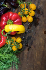 Red and purple sweet pepper and yellow tomatoes
