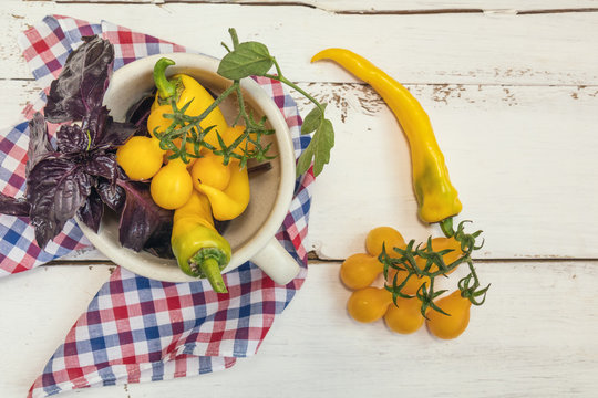  Yellow hot pepper and yellow tomatoes with purple basil