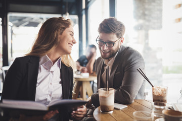 Business people talking and laughing together