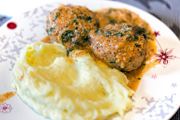 Two juicy cutlets with mashed potatoes