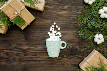 Christmas background with cup and marshmallow 
