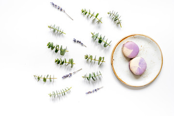 light breakfast with macaroons on spring pattern white backgroun