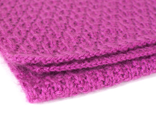 Pink knitted scarf isolated on white background