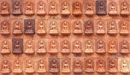 the red texture of the Buddha.