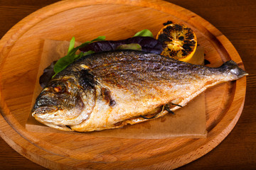 Grilled dorada with lemon