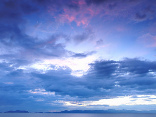 Naklejka na ściany i meble Soft blue clouds at sunset near Ko Chang, Thailand