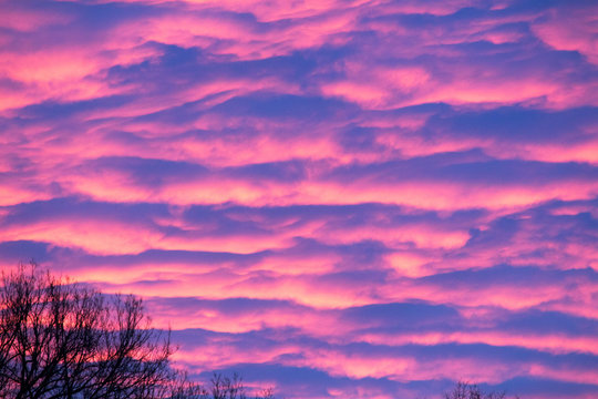 Sunset, Clouds and Blue Skies