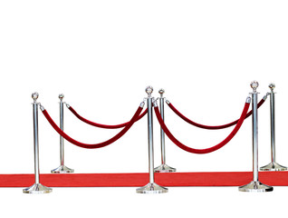 chrome steel with red velvet rope and red carpet for events, isolated on white background this has...