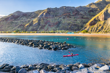  Amazing view of beach las Teresitas with yellow sand and with a kayak in the foreground on April 04, 2016 in Santa Cruz de Tenerife, Tenerife, Canary Islands