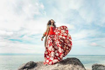 beautiful young gypsy style woman outdoors