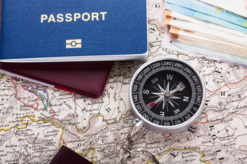 Passport And Compass On Map