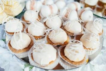 White cookies  served on white plate