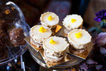 Delicious white cookies served on golden cards