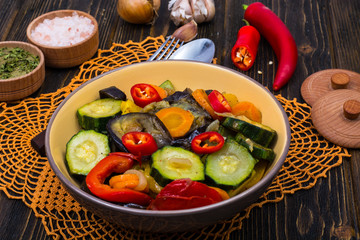 Grilled Vegetable Mix in Ceramic Bowl on Brown Plates