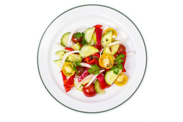 White dish with fresh vegetable salad