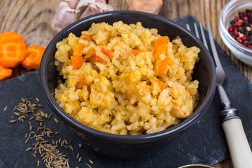 Pilaf with meat, vegetables and spices
