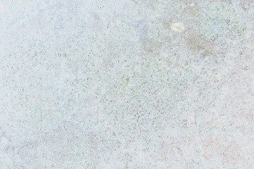 Peeling plaster on gray background.