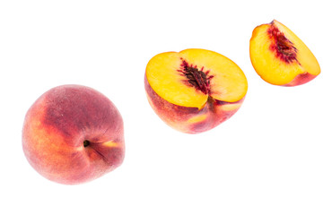 Delicious sweet ripe peach whole and slices on white
