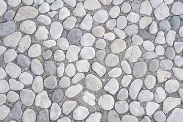 Textured gray stone pebble abstract background