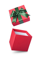 Classic red flying open gift box with green satin bow