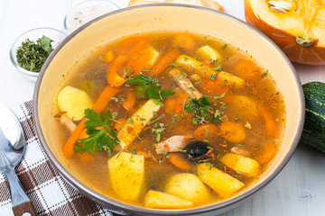 Delicious pumpkin soup with different vegetables