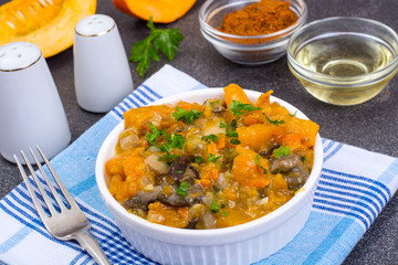 Vegetarian ragout with potatoes, carrots and pumpkin