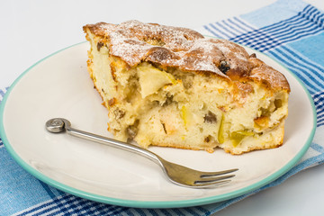 Piece of delicious apple pie with cinnamon