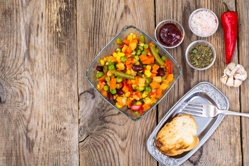 Vegetable dish with red beans in glass bowl