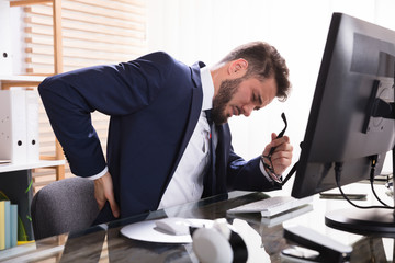 Businessman Suffering From Backache