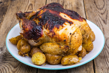 Grilled chicken with burnt skin