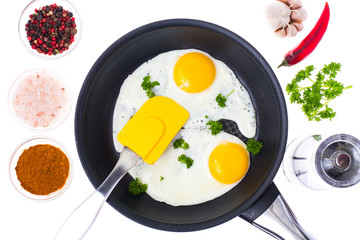 Two fried eggs on Teflon frying pan