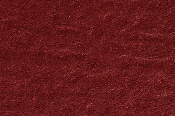 Crushed red highly textured background for christmas.