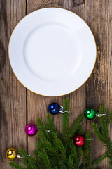 Christmas dinner on background with rustic table decorations. View from above