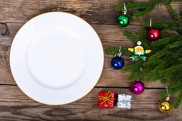 Christmas dinner on background with rustic table decorations. View from above