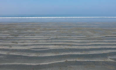 Fototapeta na wymiar Low tide on the beach