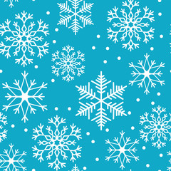 Snowflakes seamless pattern. Snow falls background. Vector illustration. Seamless pattern on a blue background