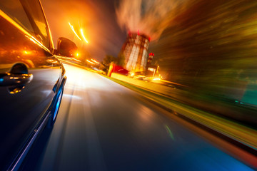 Fototapeta na wymiar Car on the road with motion blur background.