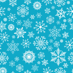 Snowflakes seamless pattern. Snow falls background. Vector illustration. Seamless pattern on a blue background
