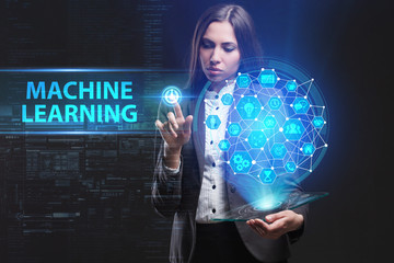 The concept of business, technology, the Internet and the network. A young entrepreneur working on a virtual screen of the future and sees the inscription: Machine learning