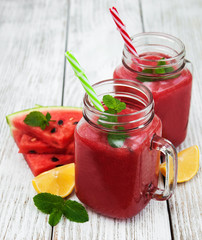 Jars with watermelon smoothie