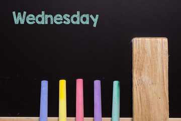 Wednesday on Blackboard with chalk and eraser