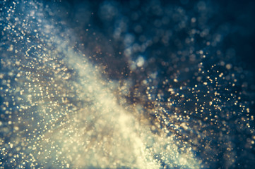 Glitter lights abstract background. Defocused bokeh dark illustration