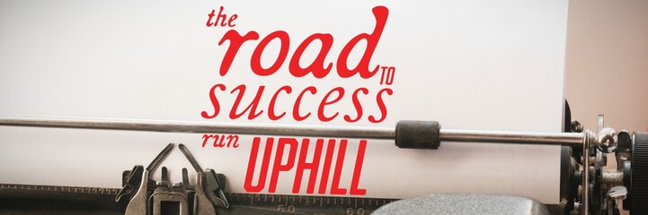 Composite image of the road to success run uphill