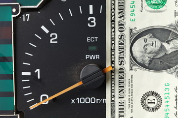 Banknote put tachometer gauge scene.