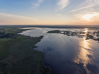 Aerial view over Zuvintas shallow lake Nature Reserve in Lithuania. During late summer evening.