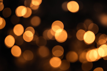 Christmas lights abstract with shiny yellow bokeh effect