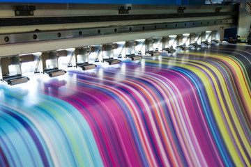 Large inkjet printer working multicolor on vinyl banner - obrazy, fototapety, plakaty